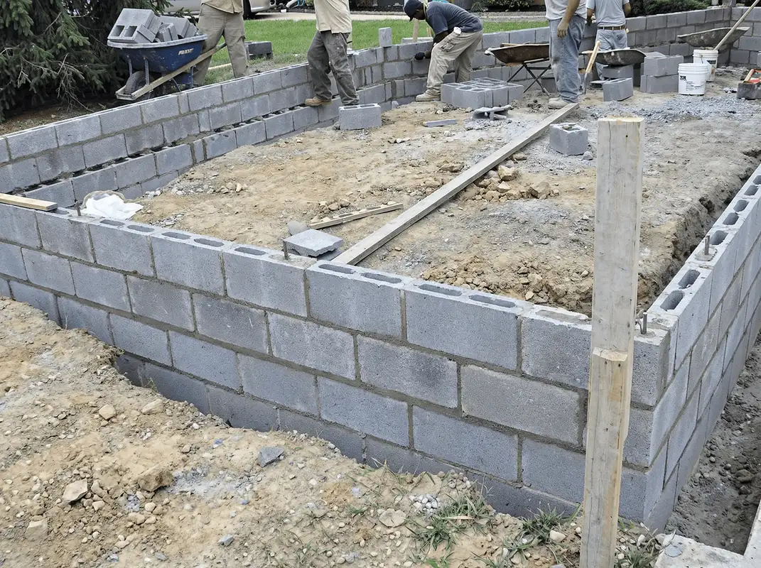 Professionals building a foundation with blocks in Columbus, OH