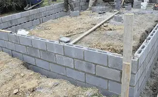 Professionals building a foundation with blocks in Columbus, OH
