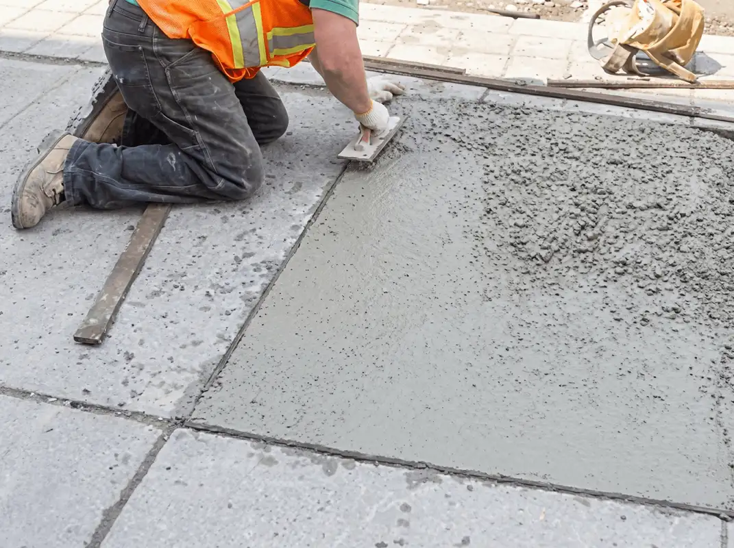 Professional repairing a concrete floor in Columbus, OH